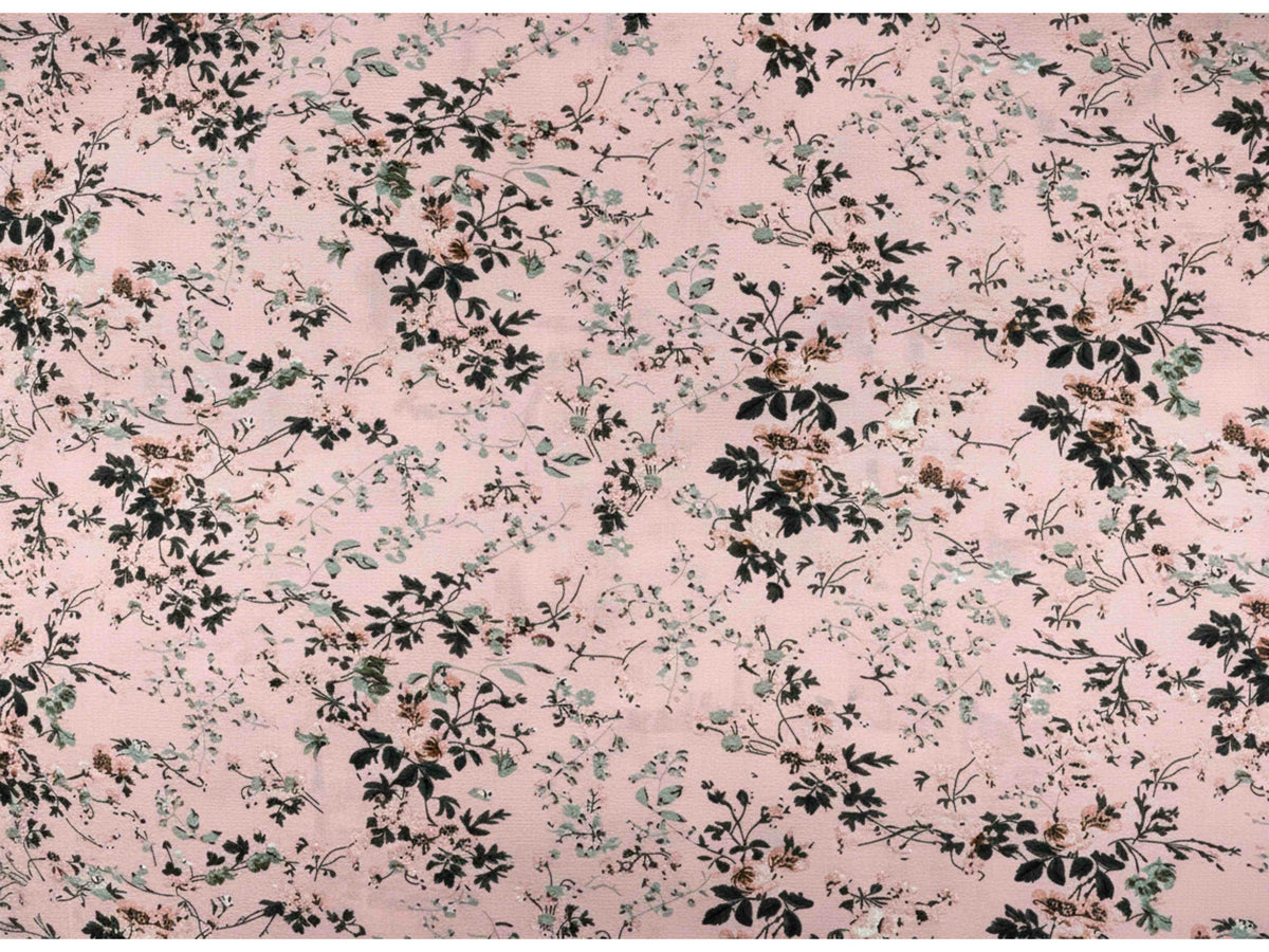 Pink textured stretch crepe fabric with a vintage meadow pattern, ideal for fashion and craft projects by Cheap Fabrics.