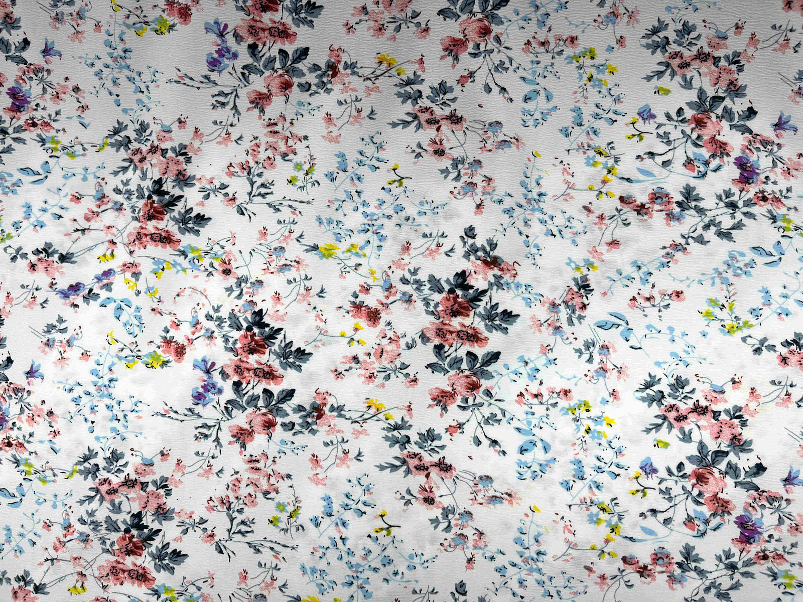 Textured stretch crepe fabric in Vintage Meadow black by Cheap Fabrics, showing a detailed close-up of the fabric's textured surface.