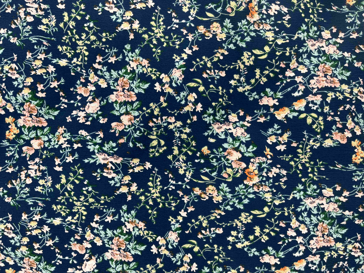 Textured stretch crepe fabric in vintage meadow navy color by Cheap Fabrics, showing a close-up of the fabric's textured surface.