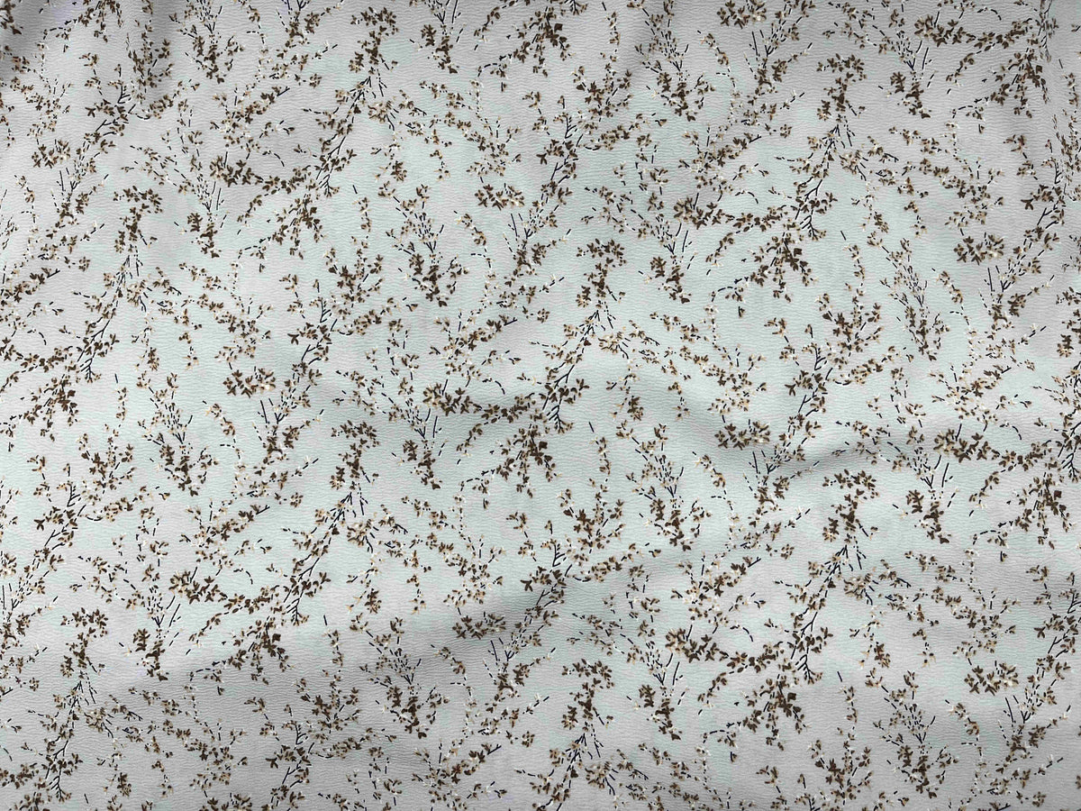 Gray textured stretch crepe fabric from Cheap Fabrics, showcasing its smooth, flexible surface perfect for fashion and sewing projects.