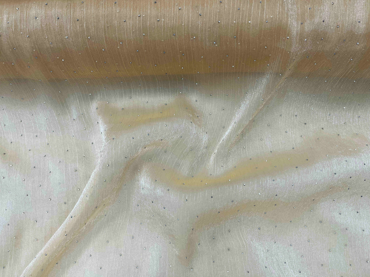 Gold Twinkle Stone Organza Fabric by Cheap Fabrics, showing shimmering, lightweight sheer material with sparkling stone accents.
