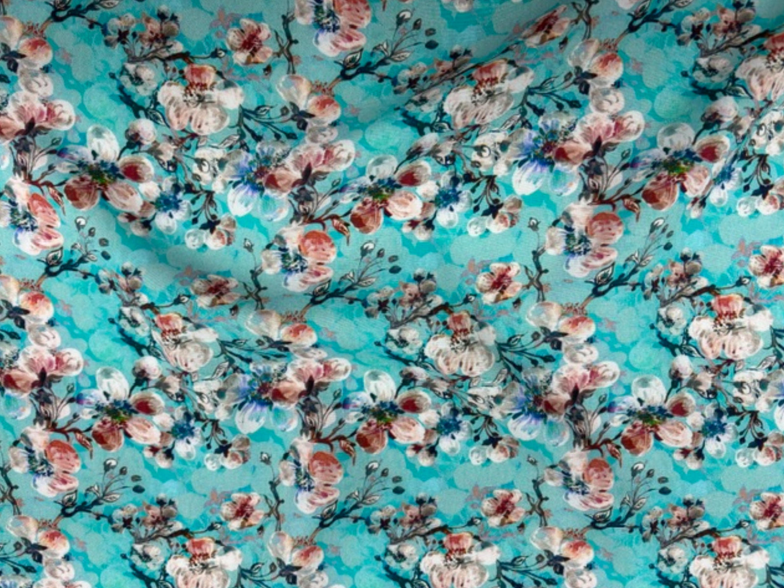 Aqua-colored viscose fabric with a budding floral print from Cheap Fabrics, showcasing a soft, lightweight textile perfect for garments.