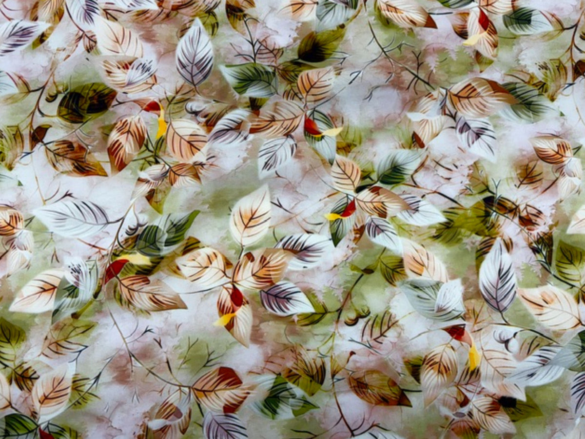 Sage-colored Deluxe Printed Viscose Fabric with leaf pattern from Cheap Fabrics, showcasing smooth, lightweight textile with botanical print.