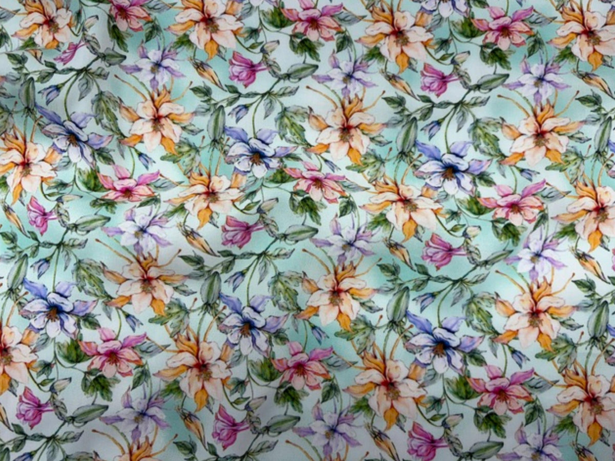 Deluxe printed viscose fabric with a pastel meadow mint floral pattern by Cheap Fabrics.