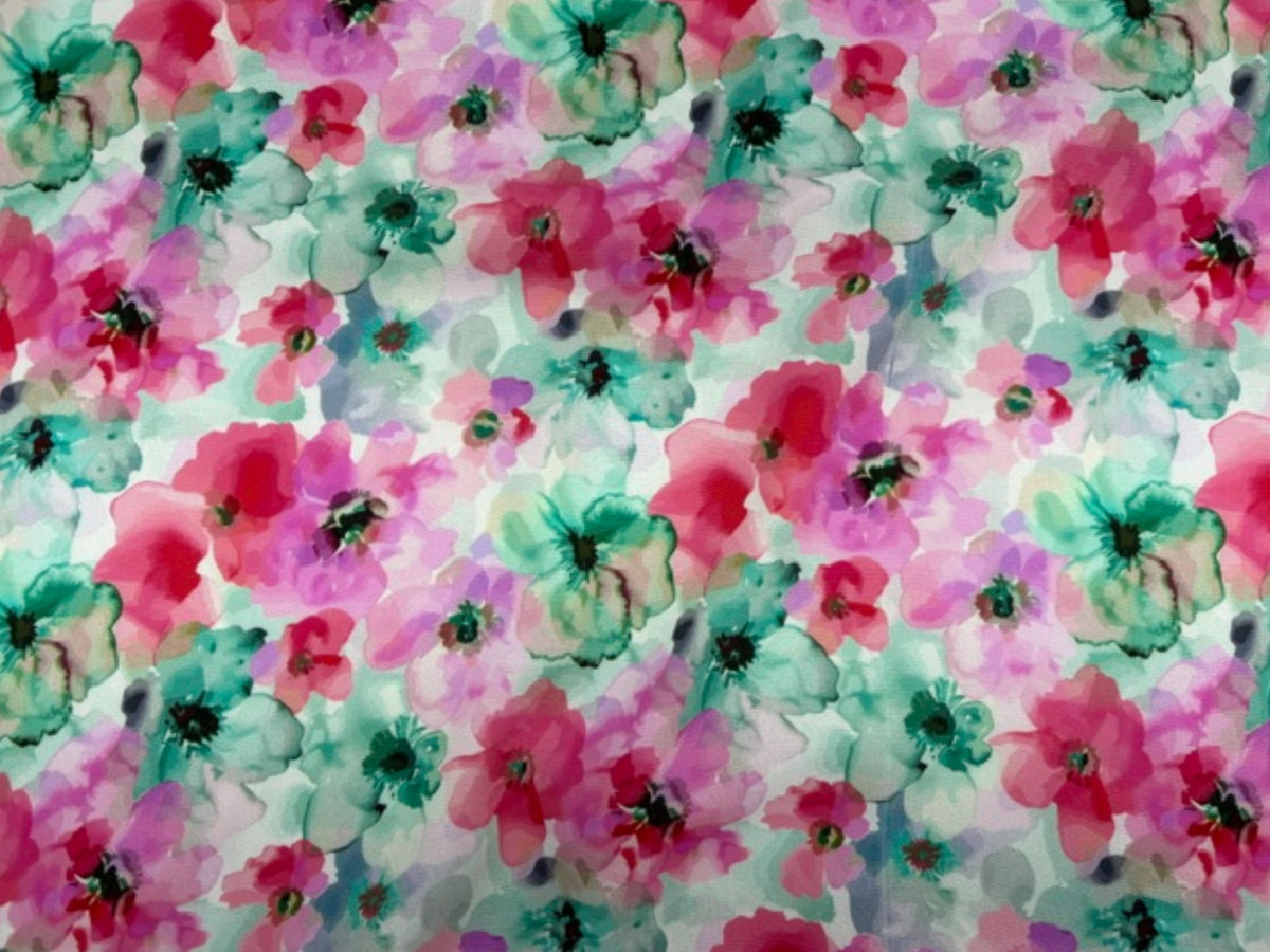 Waterfloral printed viscose fabric by Cheap Fabrics, featuring vibrant cerise water floral pattern on smooth, lightweight material.