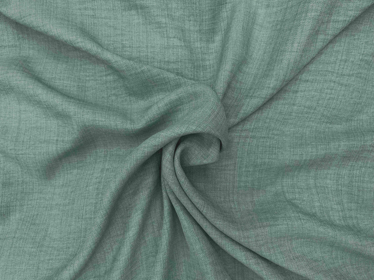 Pastel green washed melange crepe fabric by Cheapfabrics, showing soft, textured melange pattern and lightweight fabric surface.